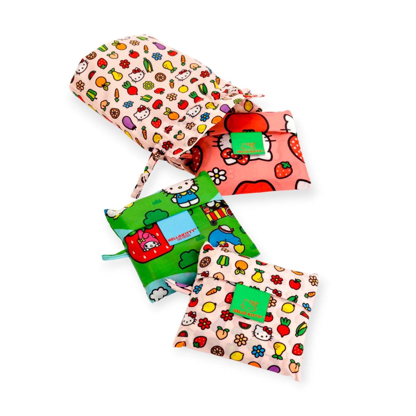 Three vibrant fabric pouches from the Hello Kitty x Baggu Set, made from recycled polyester, showcase playful prints of fruits, florals, and animals. These cheerful designs reflect Baggu's signature style and stand out beautifully against a white background, adding a delightful charm to any area.