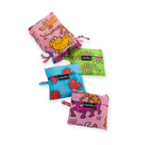 The Keith Haring x Baggu set of 3 standard bags, branded by Baggu, are colorful and crafted from recycled nylon, showcasing playful animal and heart designs. These pink, blue, and green bags feature either drawstring or zipper closures.