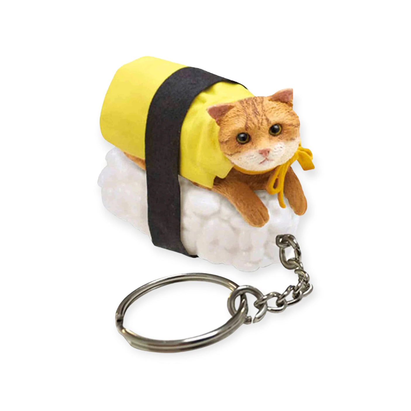 The Sushi Cat Keychain Blind Box - Vol.1 from Mofusand introduces an adorable feline figurine dressed as sushi, complete with a yellow blanket and black band, attached to a metal chain, perfect for adding a touch of kawaii flair. Discovering one in your next blind box might just be the cutest surprise!