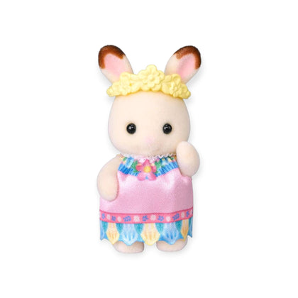 White bunny figurine with pink-blue dress and yellow flower headband