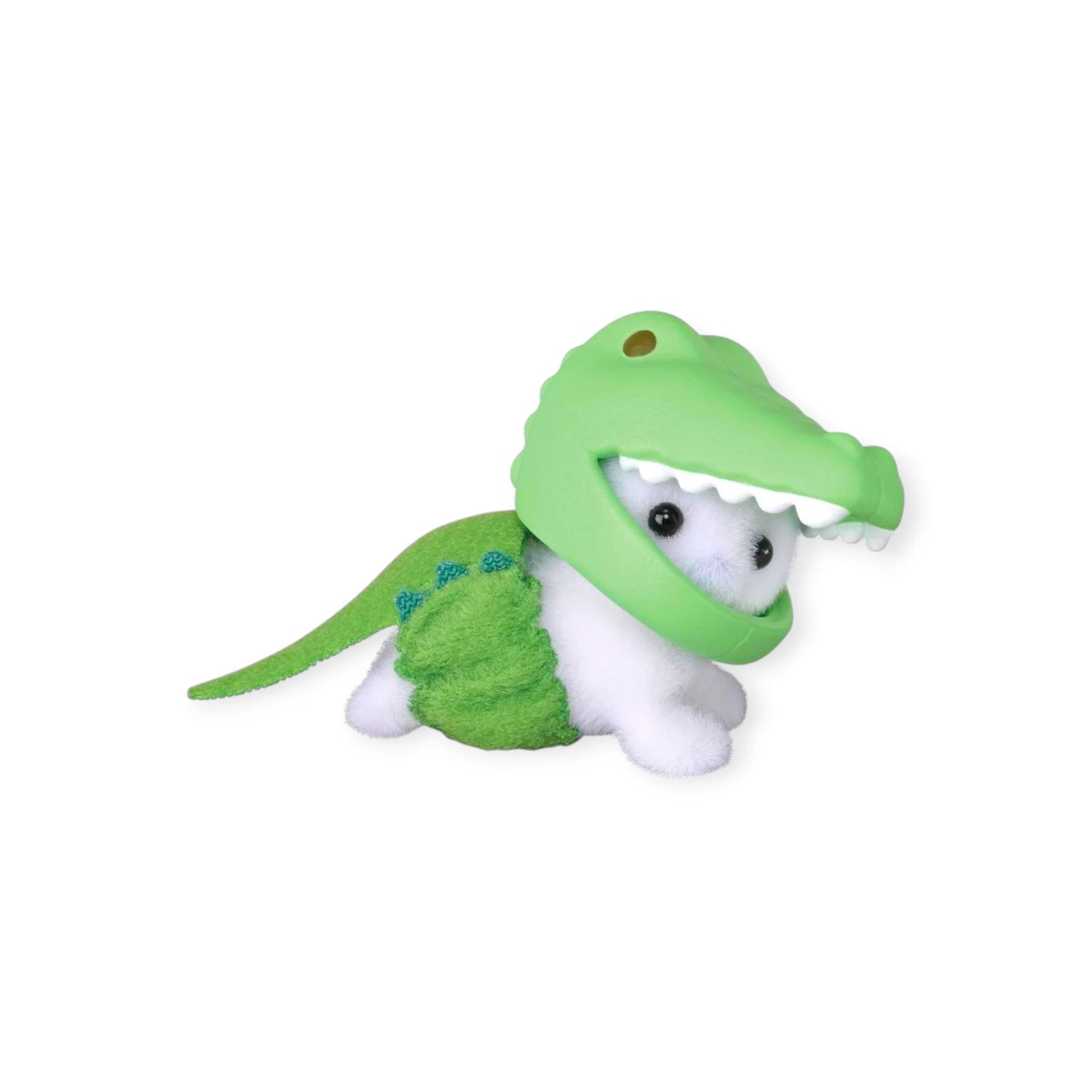 Green and white dinosaur baby figurine with small grass accessory