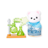White bear figure in blue outfit beside green potion chemistry set on base.