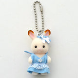 White plush baby rabbit keychain with blue dress, bow, and silver bead ball chain