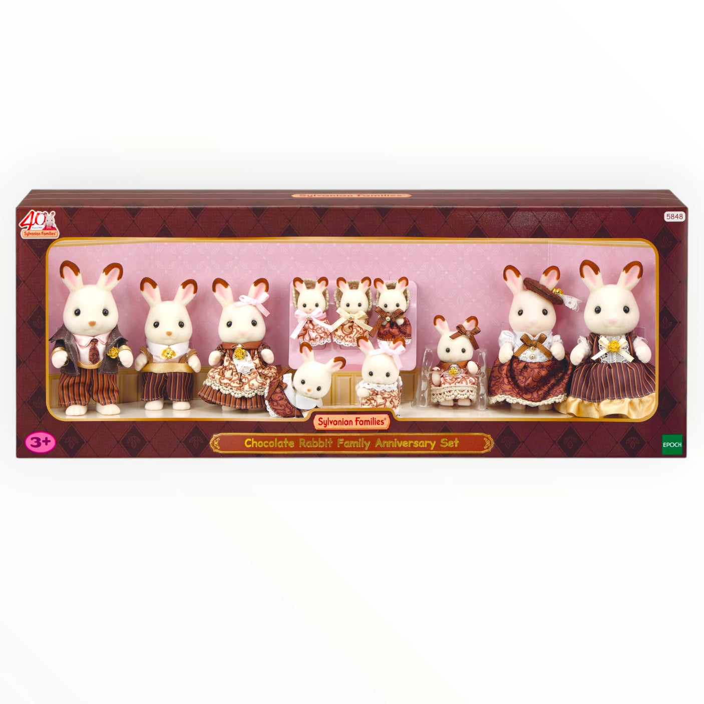Sylvanian Families - Chocolate Rabbit Family Anniversary Set with detailed plush rabbits dressed in elegant vintage outfits in packaging