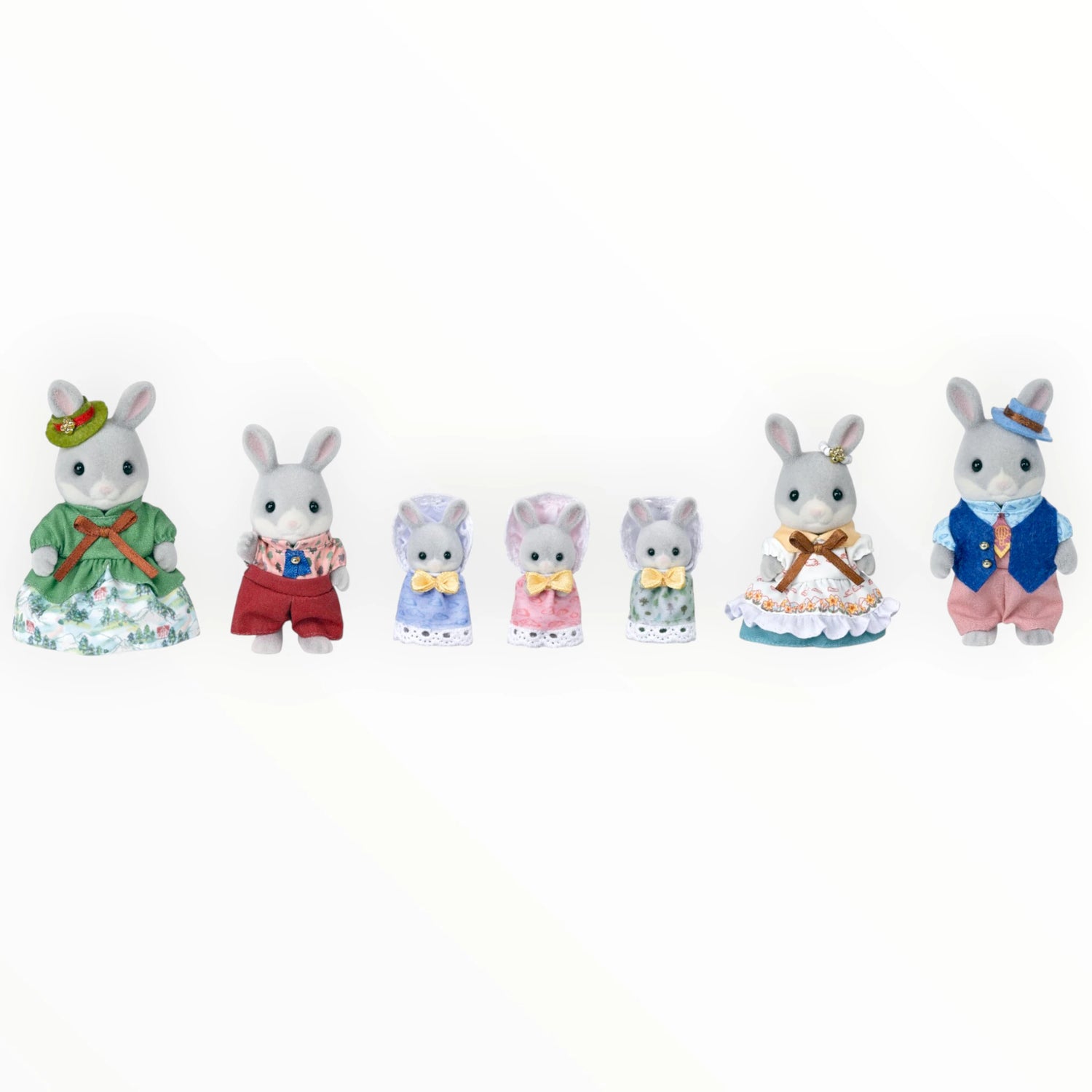 Sylvanian Families - Cottontail Rabbit Family Celebration Set with seven bunny figurines in colorful festive attire by Epoch