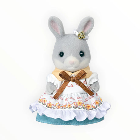 Sylvanian Families - Cottontail Rabbit Family Celebration Set gray rabbit figurine in floral dress with brown bow and small white hat accessory