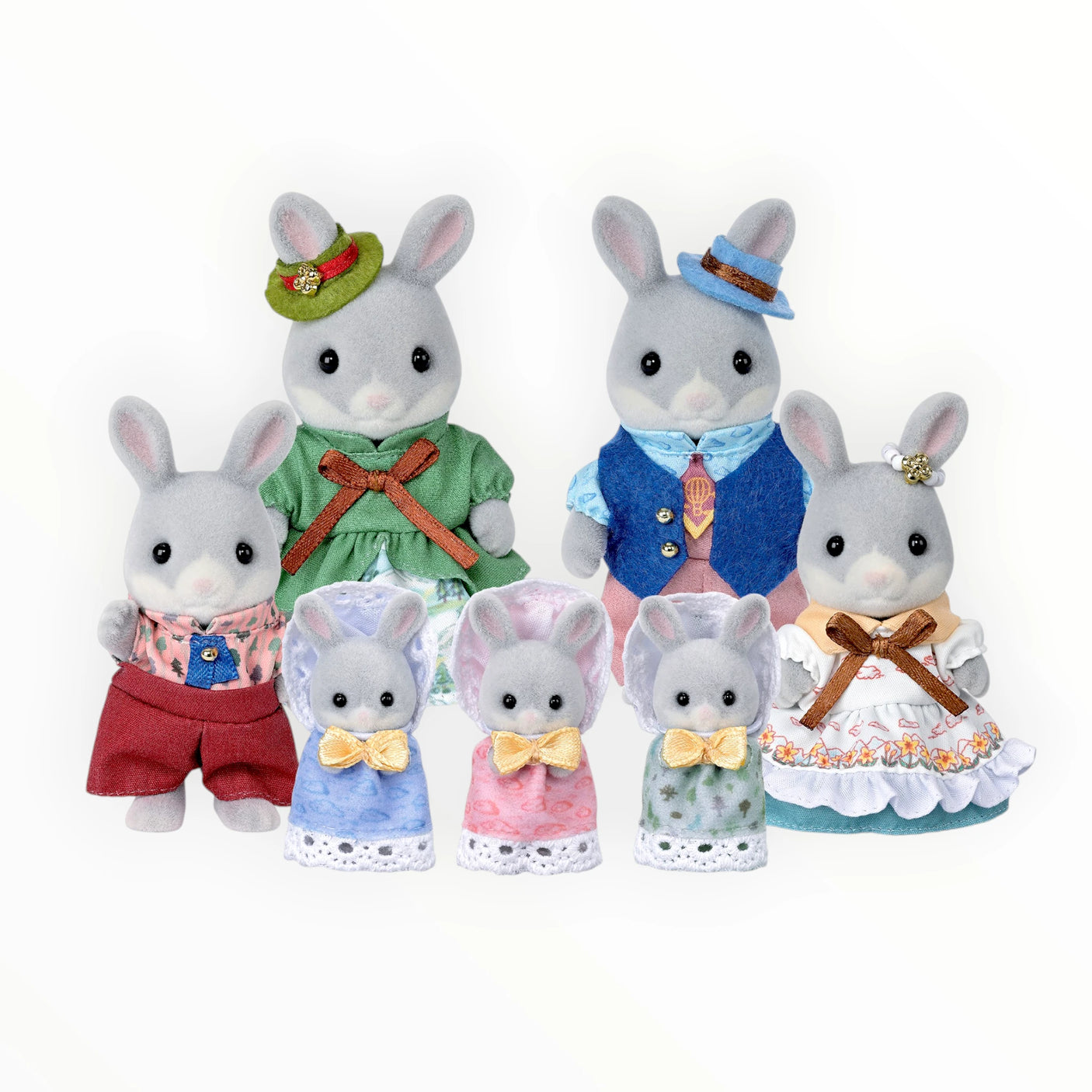 Sylvanian Families - Cottontail Rabbit Family Celebration Set with seven dressed rabbit figures in festive outfits on white background