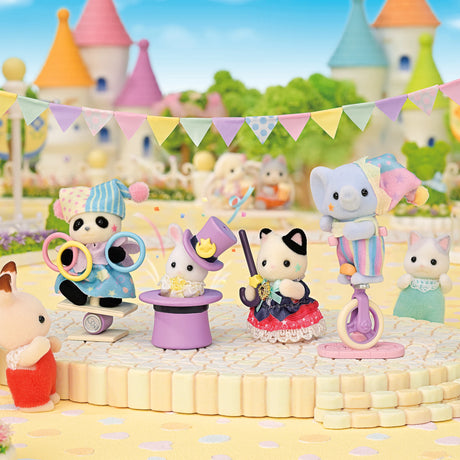 Sylvanian Families - Dream Showtime Babies featuring five plush animal babies dressed in colorful circus costumes with accessories outdoors
