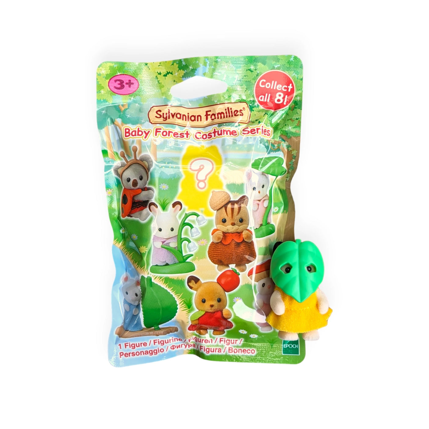 The Sylvanian Families Blind Bag - Baby Forest Series presents charming animal figures on its packaging, highlighting a cute figure dressed in a green leaf hood and yellow clothing at the forefront, enticing you to discover the magic of surprise with these beloved blind bags.