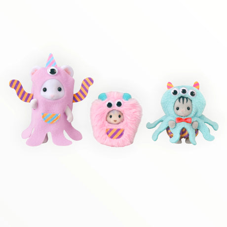 Sylvanian Families - Funny Monster Trio featuring three plush figures in colorful monster costumes with moving goggle eyes