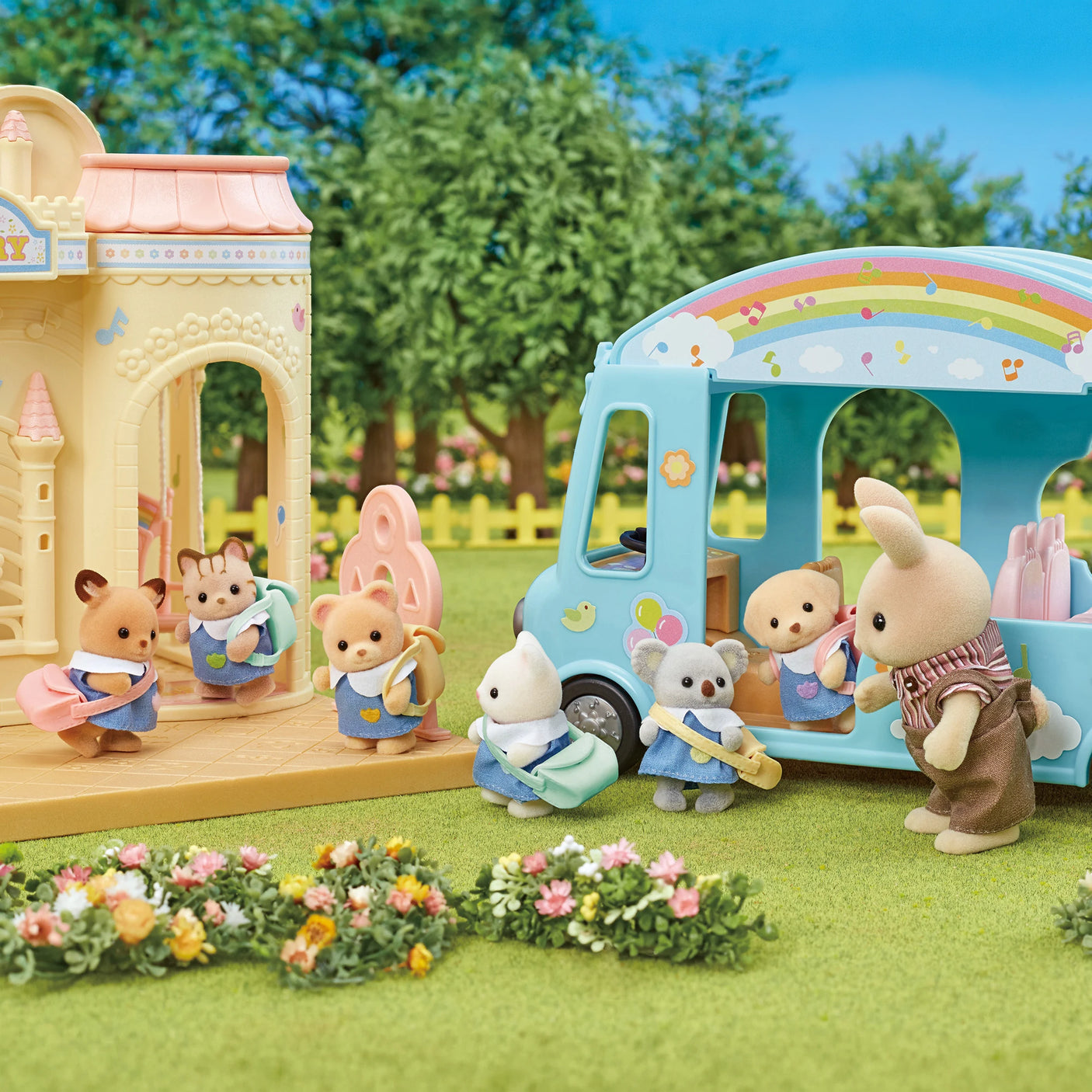 Sylvanian Families - Nursery Playmates with six baby animal figures in nursery uniforms and colorful play bus outdoors