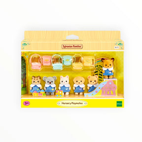 Sylvanian Families - Nursery Playmates with six baby animal figures in nursery uniforms and backpacks with playground slide