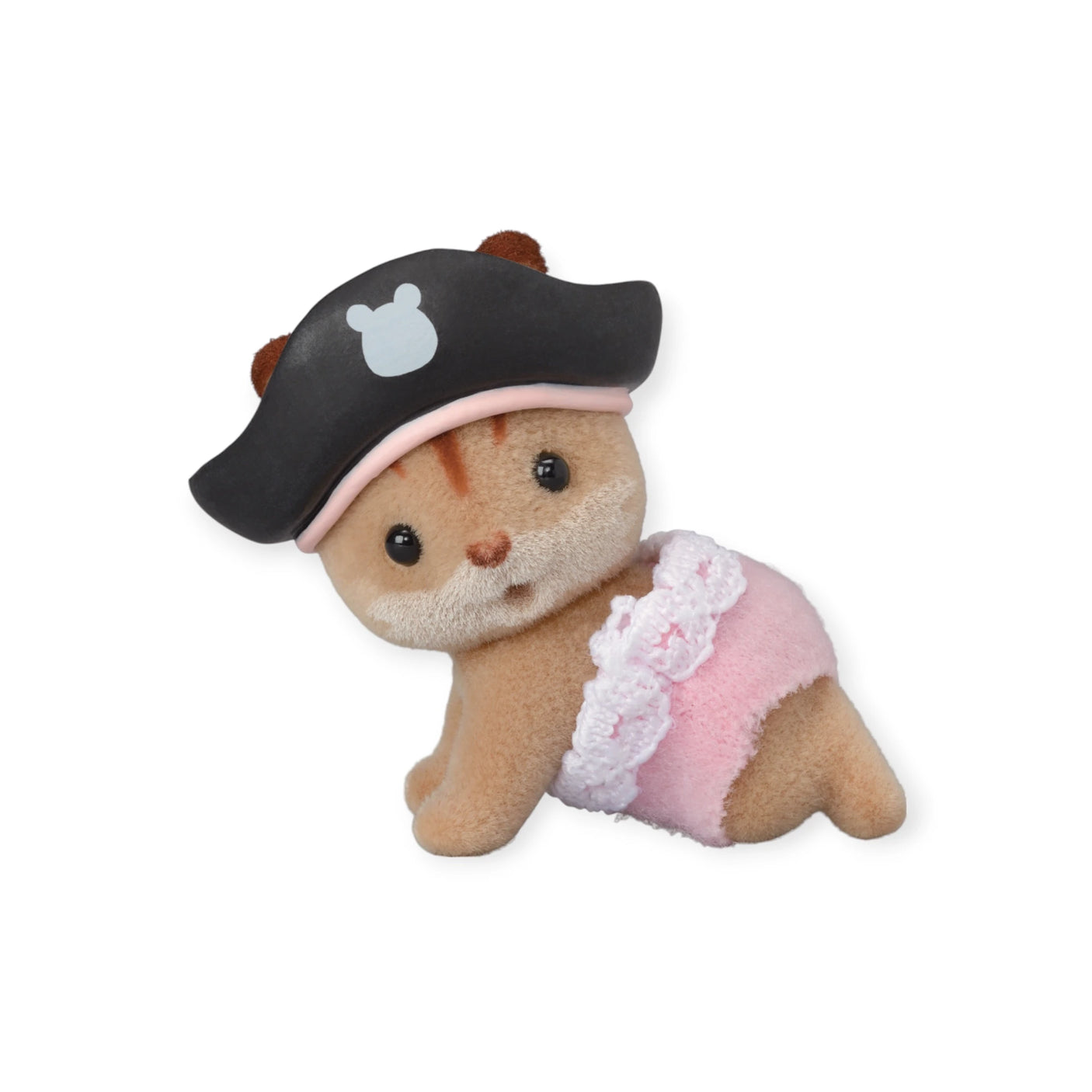 From the Sylvanian Families Blind Bag - Baby Costume collection, this charming toy animal wears a black pirate hat and a pink outfit with white lace, posed lying on its front like an enigmatic figure prepared to sail the seven seas.