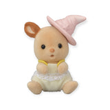 A small plush toy rabbit from the Sylvanian Families Blind Bag - Baby Costume series is dressed in an upright position, featuring a pink hat and a cheerful yellow outfit.