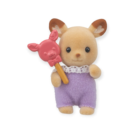 This charming figurine from the Sylvanian Families Blind Bag - Baby Treats Series showcases an animal dressed in a purple outfit, carrying a red animal-shaped object on a stick. Unveil your mystery character with this thrilling blind bag collectible!