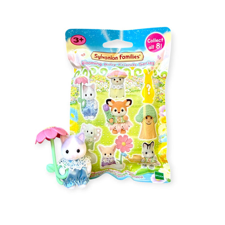 A toy rabbit figurine with a pink umbrella stands beside the Sylvanian Families Blind Bag - Blooming Baby Friends packaging, featuring delightful animal mini figures.