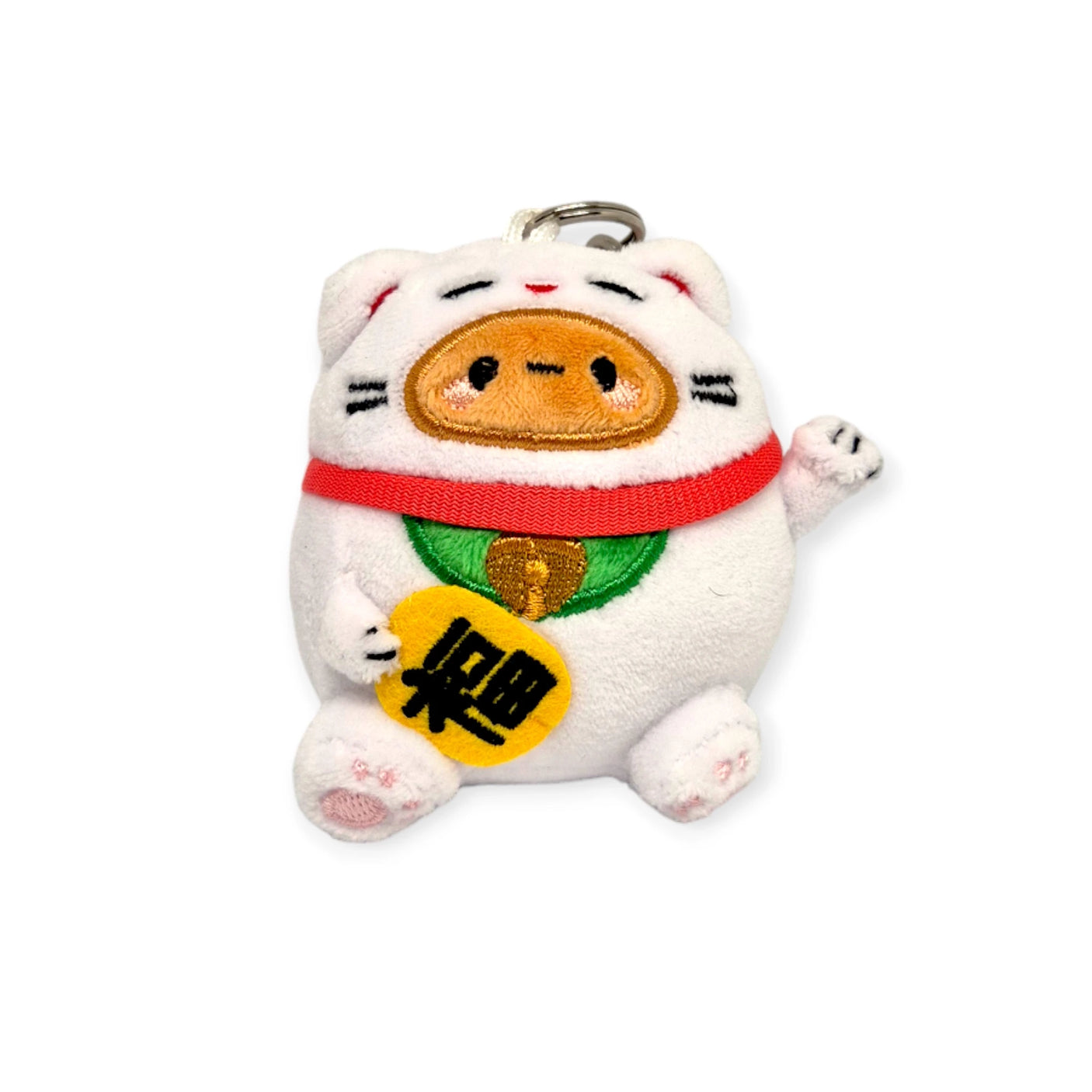 Introducing the Smoko Tayto Potato Lucky Cat Keychain Plushie by Smoko, an adorable accessory that channels good fortune with its cat design featuring a coin symbol and a raised paw, reminiscent of the classic Maneki-neko. Ideal for anyone looking to add charm and luck to their daily endeavors.