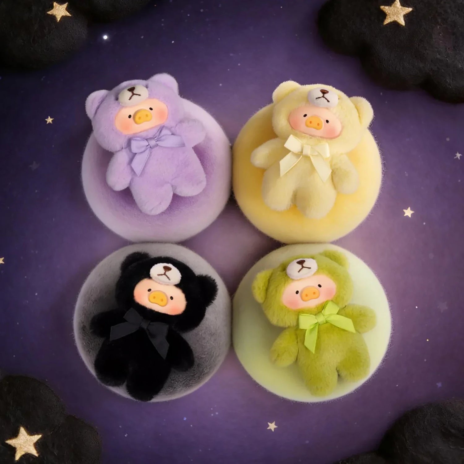 Teddy LuLu - Whispers of Nature Plush Charm - Blind Box showing four LuLu The Piggy plush charms in pastel teddy suits on colored cushions
