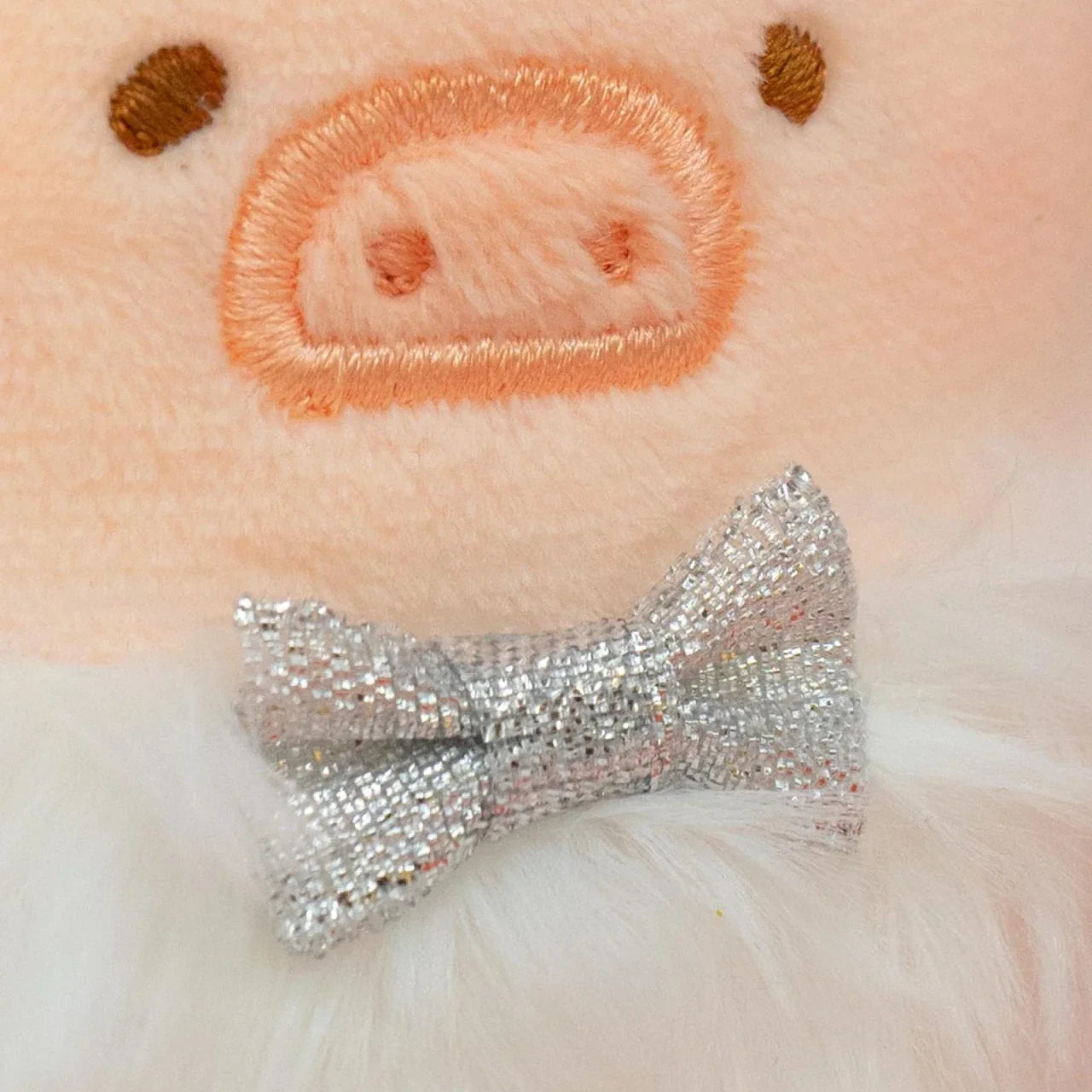 Fuzzy Christmas pig keychain with silver sequin bow and embroidered snowball oval