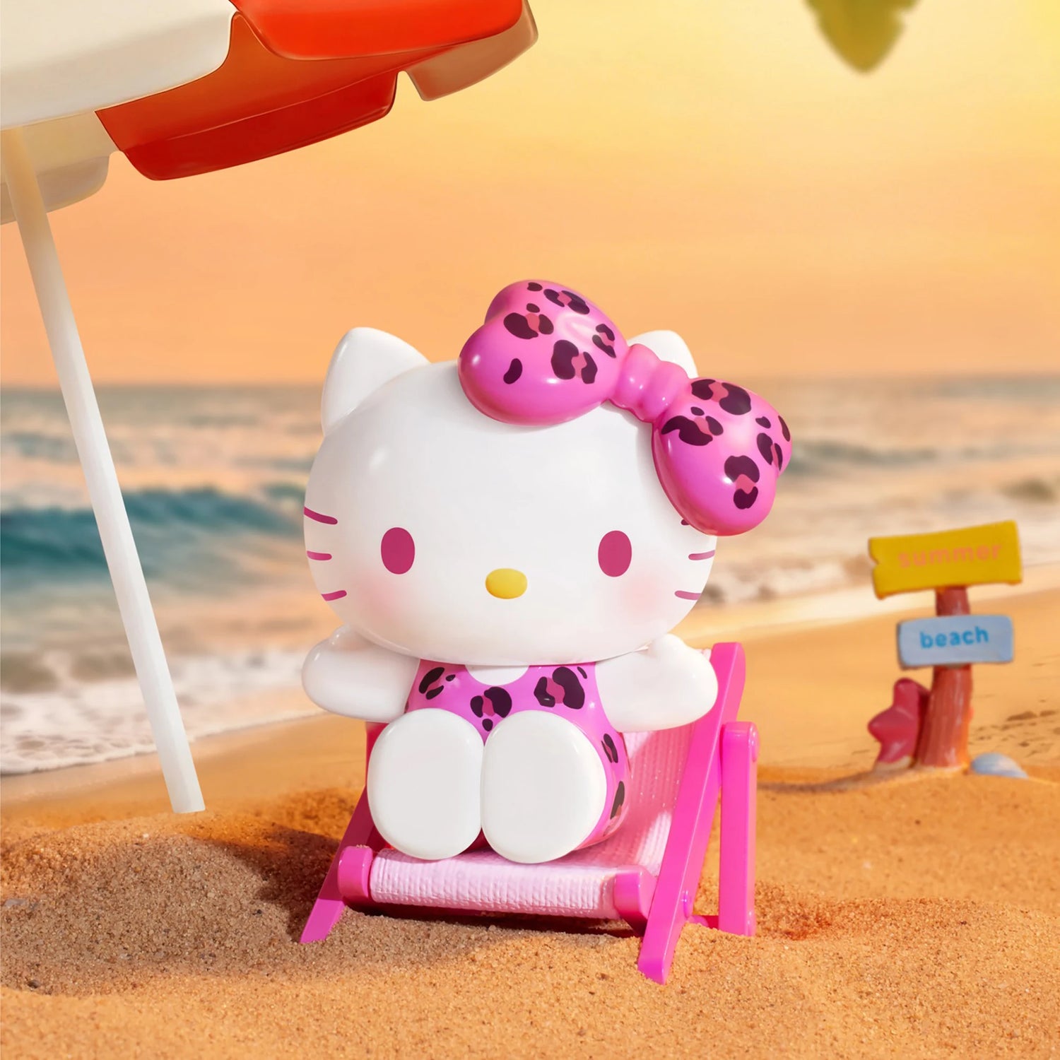 Hello Kitty summer beach blind box figure with leopard bow sitting on a pink chair