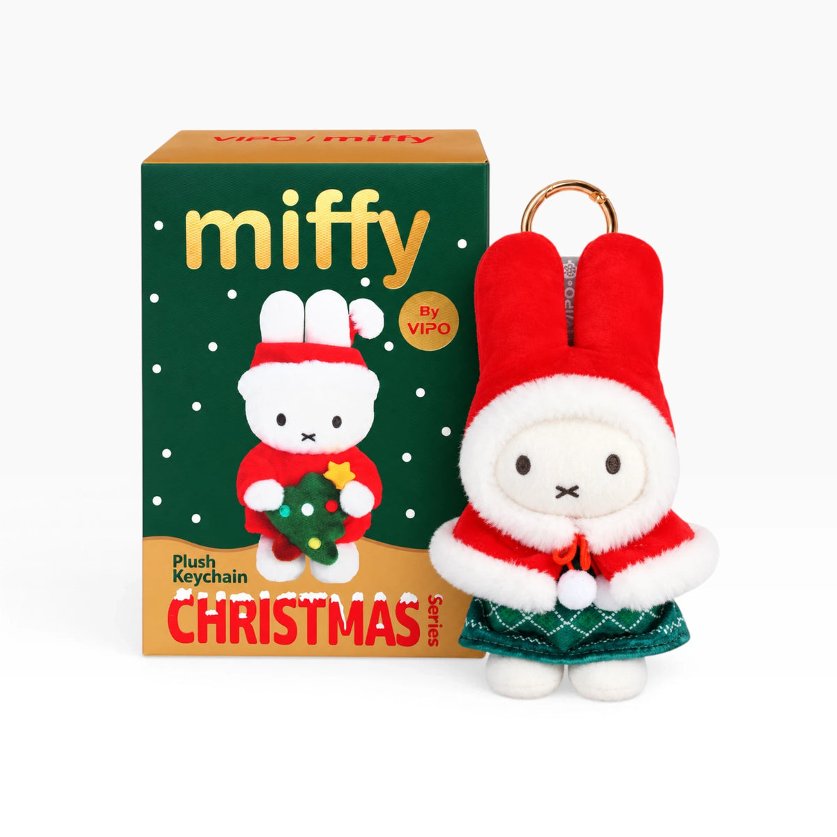 White rabbit Christmas plush keychain in red hood with green skirt and star detail