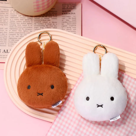 Brown and white plush rabbit pouch keychains with metal key rings