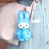 Blue plush rabbit raincoat keychain with metal ring and bunny pattern hood