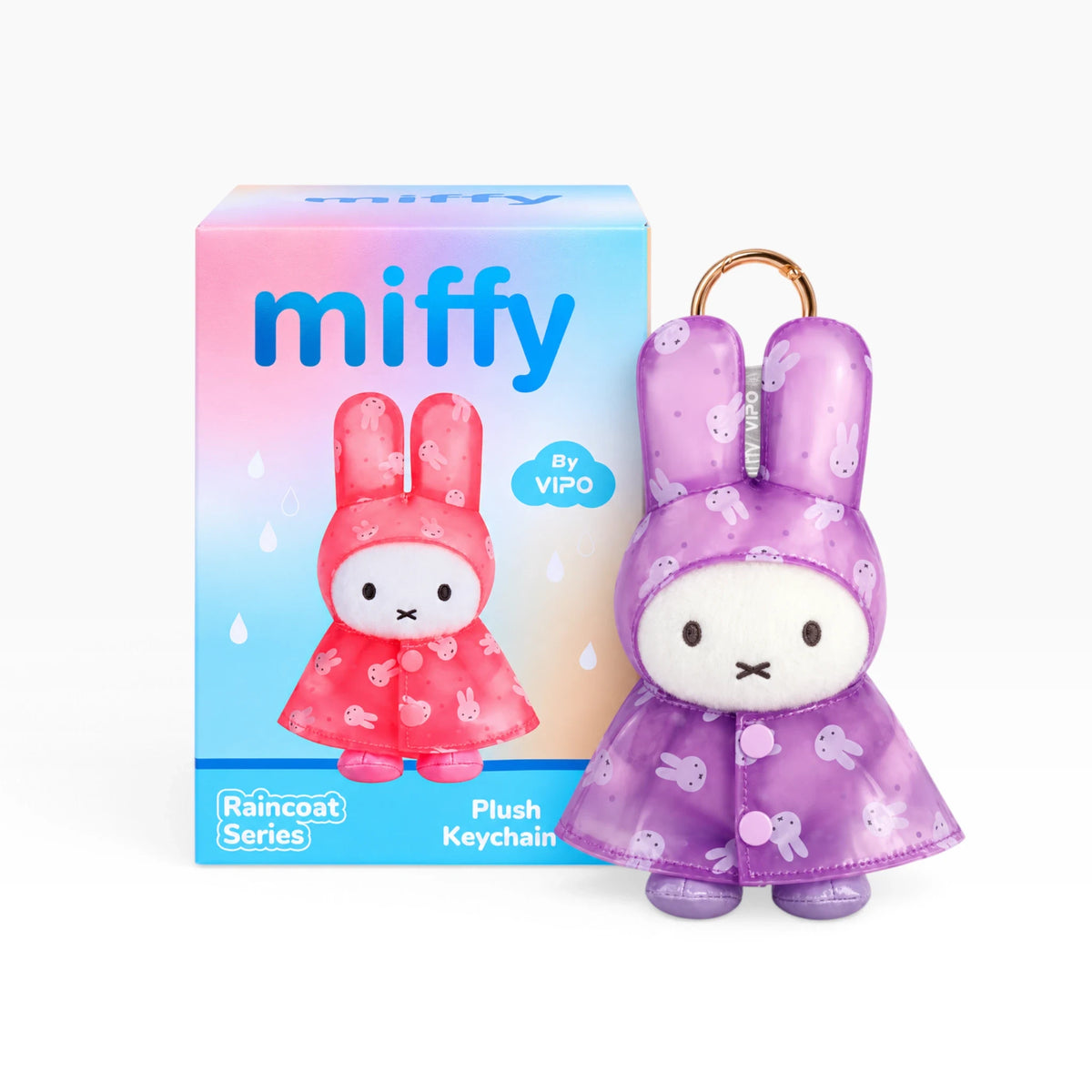 Purple plush rabbit raincoat keychain in a retail box labeled miffy