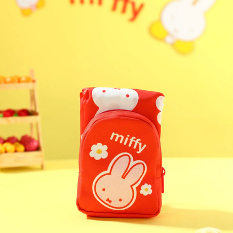 Orange miffy bunny mini keychain pouch with zipper and flower detail