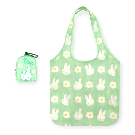 Light green miffy tote bag with bunny-and-flower pattern, plus small green "Dan" key pouch