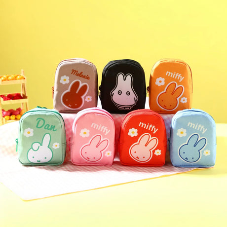 Set of colorful miffy mini keychain pouches with bunny and flower prints
