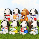Assorted Snoopy soccer plush keychains with different jerseys, each holding a soccer ball