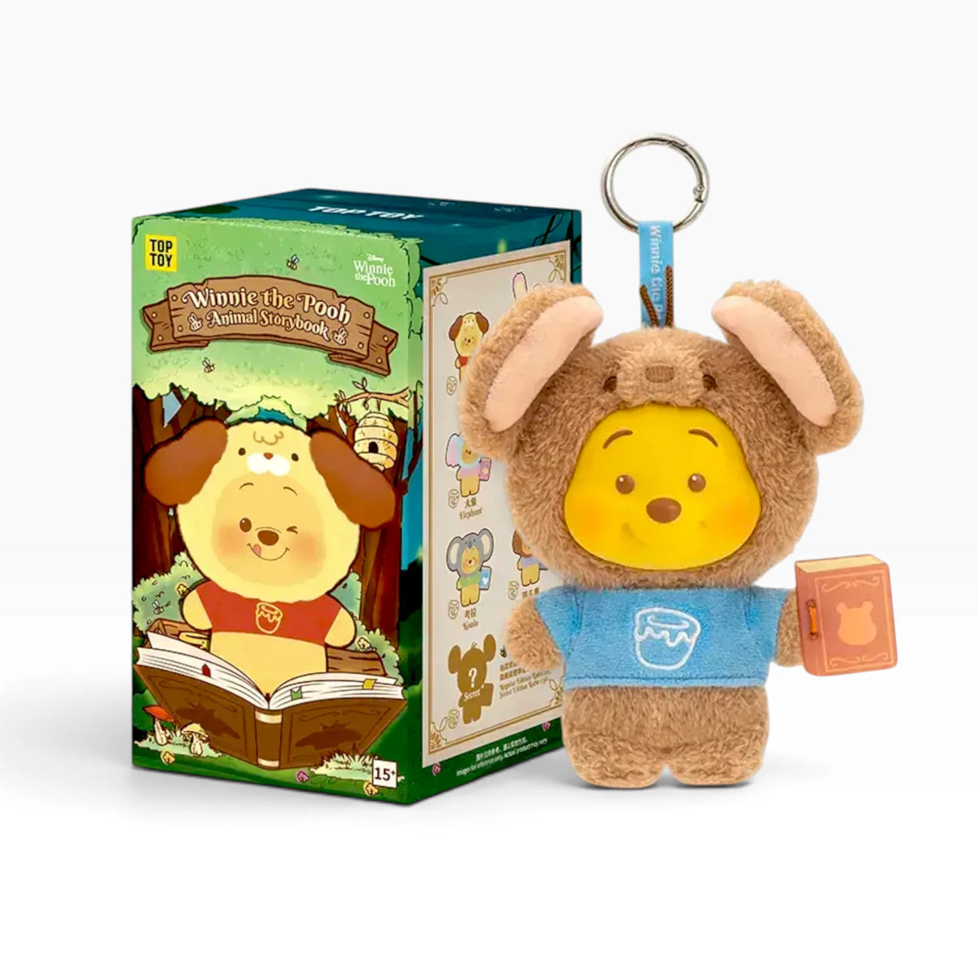 Brown plush animal keychain with long ears and yellow character face, book-style tag