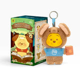 Brown plush animal keychain with long ears and yellow character face, book-style tag
