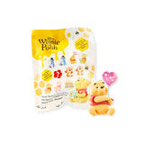 Mini figurine blind bag with Pooh holding a red balloon
