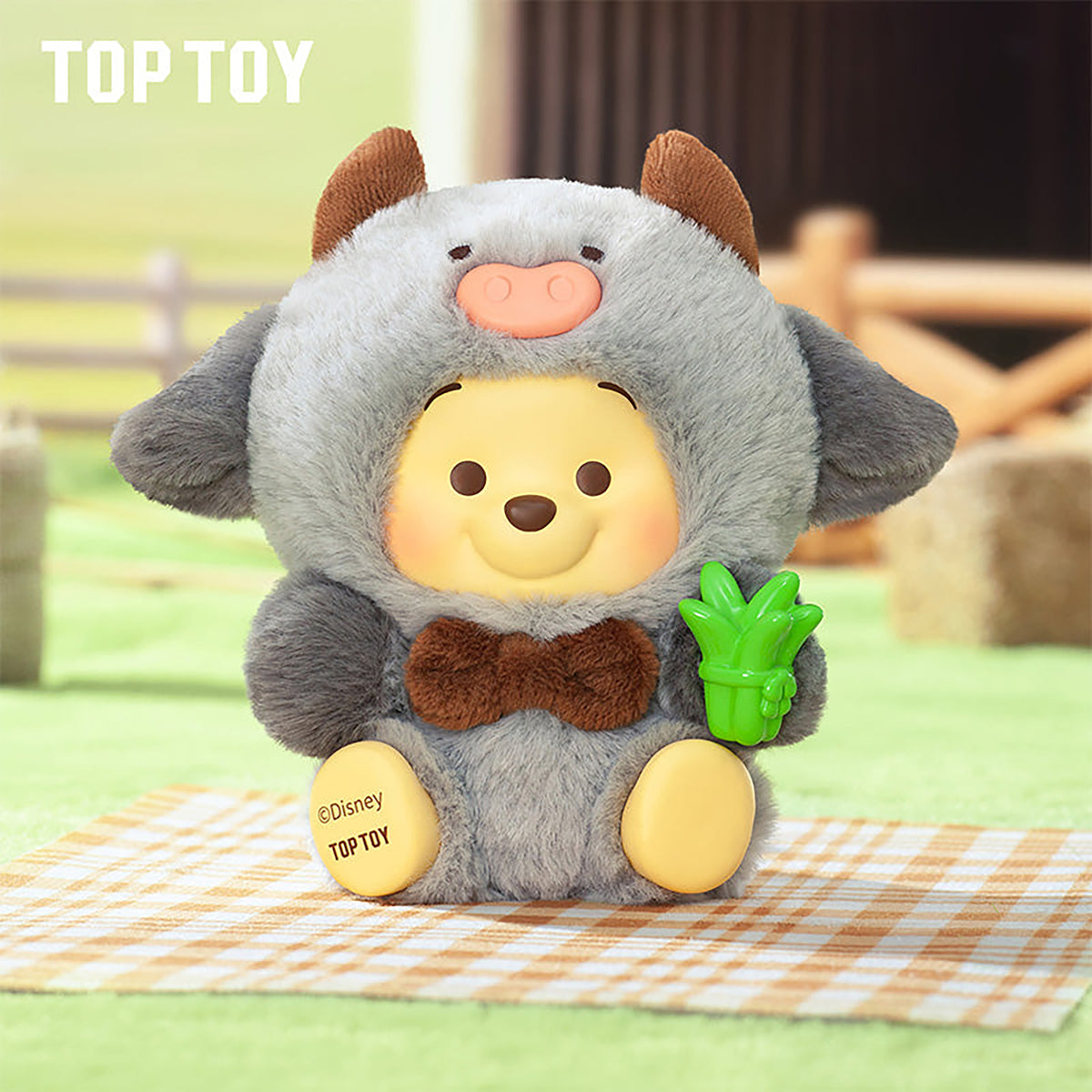 Gray plush Winnie the Pooh pig costume figure holding green vegetable