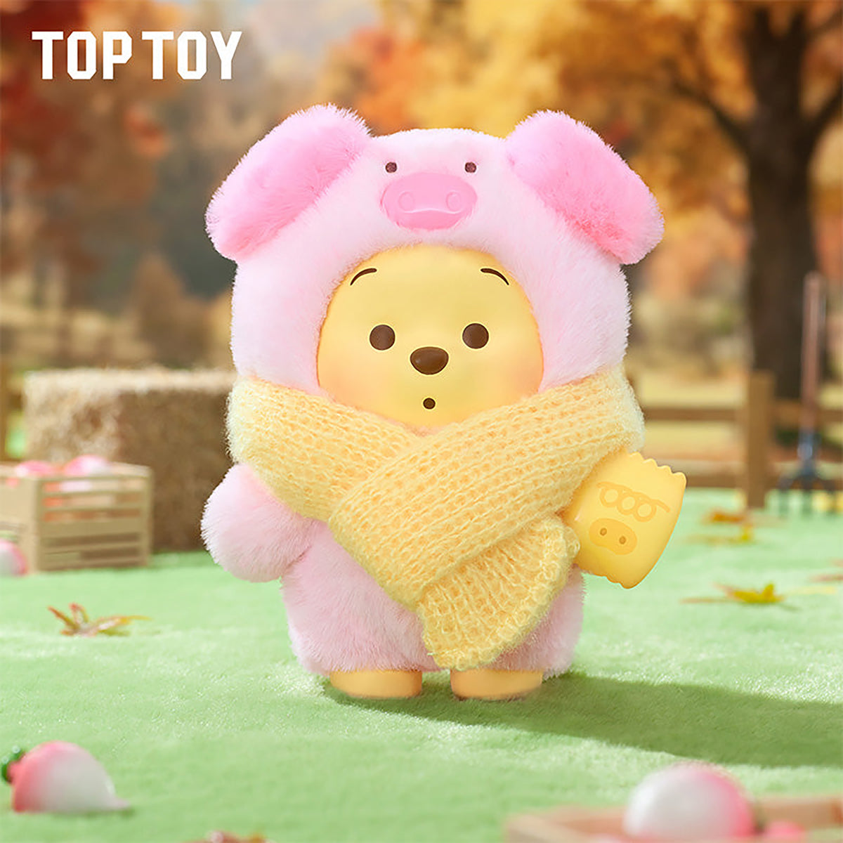 Pink plush Winnie the Pooh pig costume figure with yellow scarf
