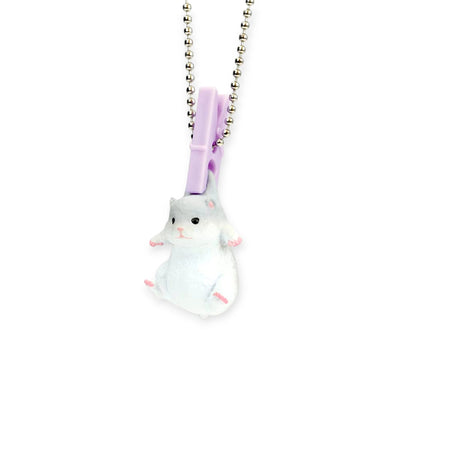 A small white animal minifigure charm from Yell's Washing Line Critters Charm Blind Box hangs by a purple clothespin on a silver bead chain, adding playful fun to your keychain.