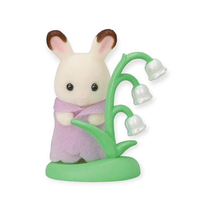 Sylvanian Families blind bag rabbit figure holding green stems with white flowers