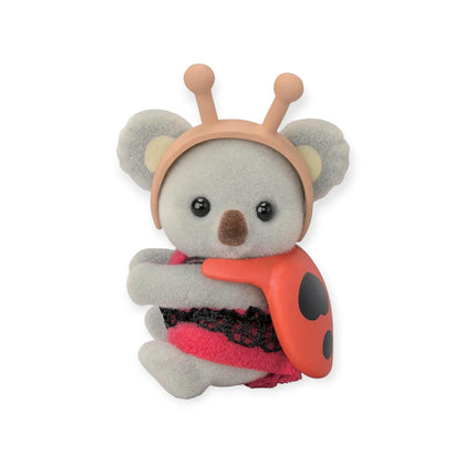 Sylvanian Families blind bag animal figure in ladybug costume with antenna headband