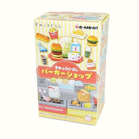 The "Re-Ment Sumikko Burger Shop - Blind Box" by Re-Ment showcases delightful miniatures of food items and charming characters.